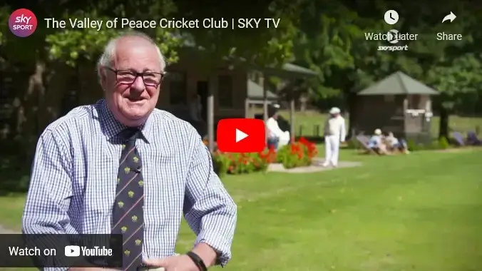 Scott Cartwright in tie at Valley of Peace cricket pavilion